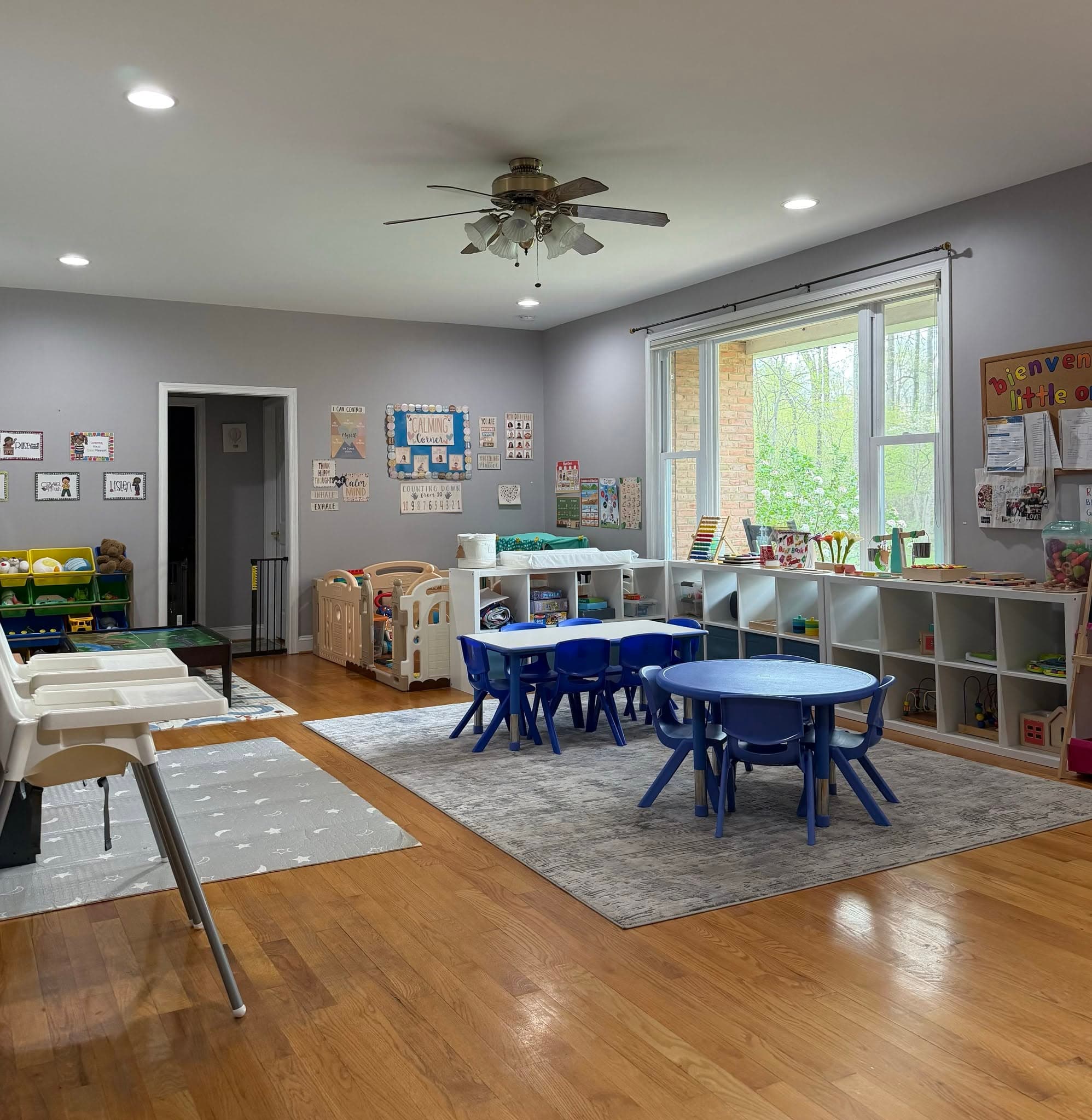 A bright classroom at Little Ones Farm with learning materials and child-sized tables